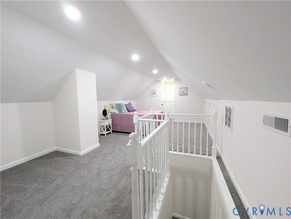 407 Washington Avenue Colonial Heights, VA 23834 - Photo 28 of 41 Bonus room with carpet flooring and vaulted ceilin