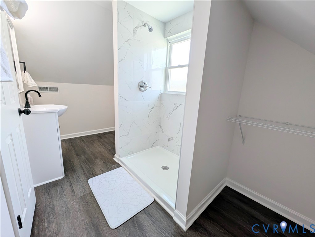 407 Washington Avenue Colonial Heights, VA 23834 - Photo 31 of 41 Full bath with a marble finish shower, lofted ceil