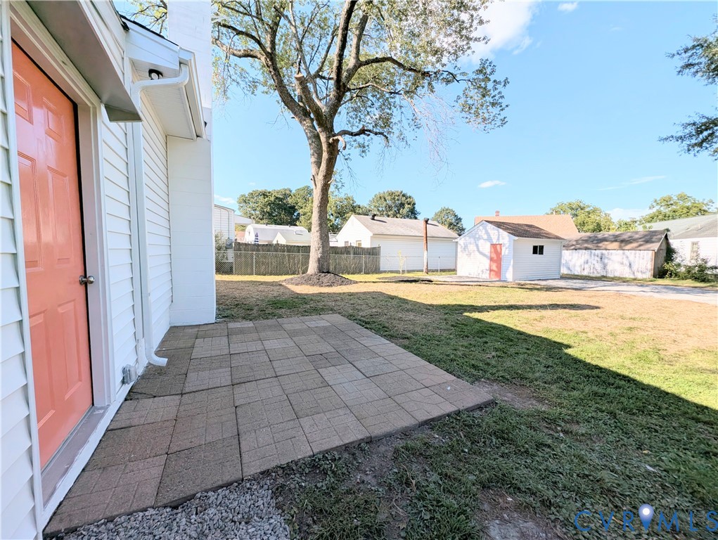 407 Washington Avenue Colonial Heights, VA 23834 - Photo 34 of 41 View of yard with a patio area and a storage shed