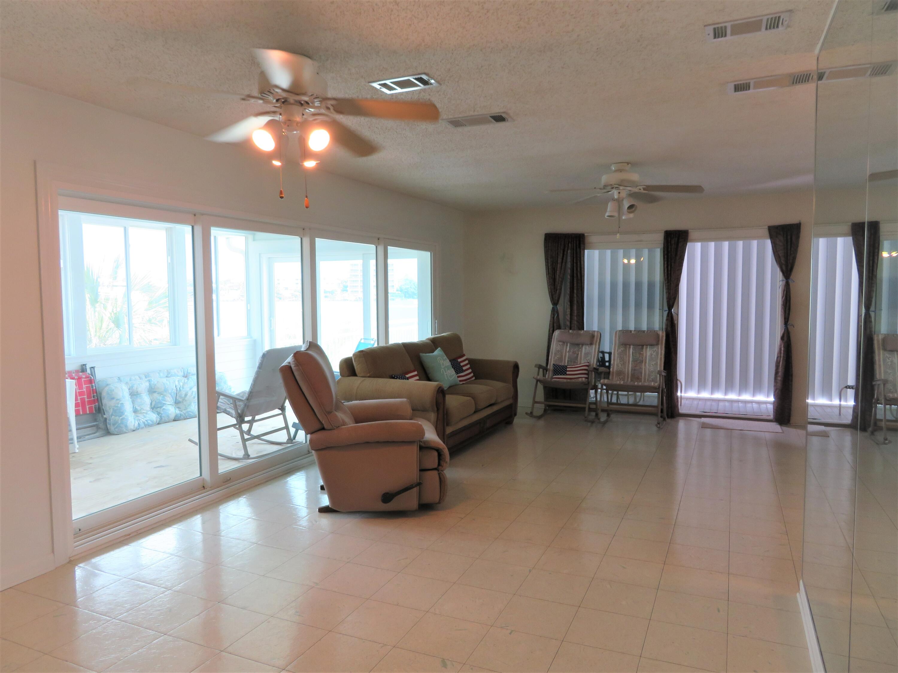 191 Durango Road Destin, FL 32541 - Photo 16 of 25 a living room with furniture and a large window