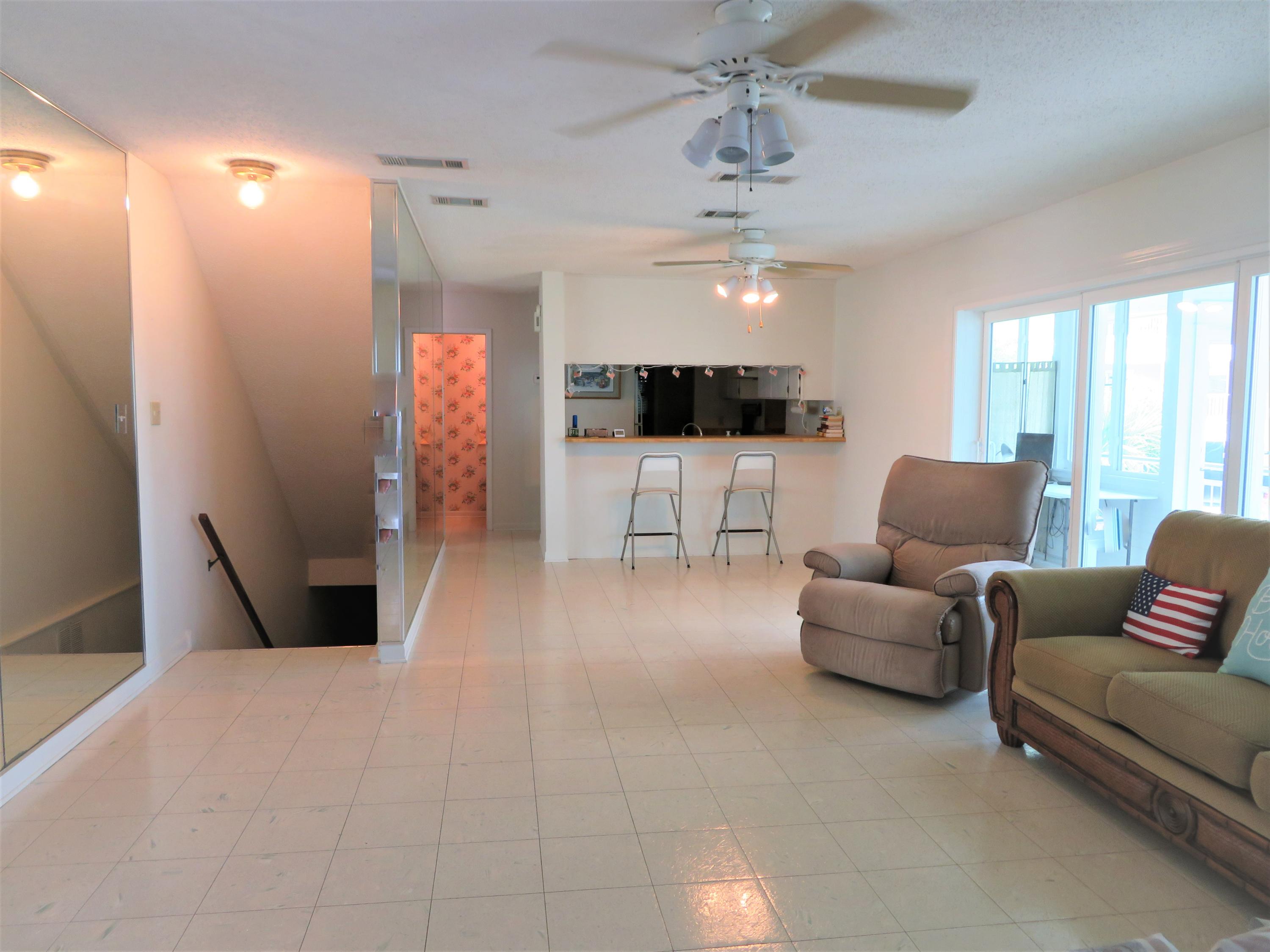 191 Durango Road Destin, FL 32541 - Photo 17 of 25 a living room with furniture and a flat screen tv