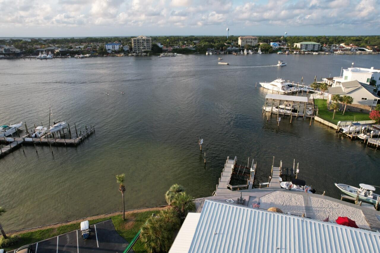 191 Durango Road Destin, FL 32541 - Photo 4 of 25 a view of a lake with boats and trees in the background