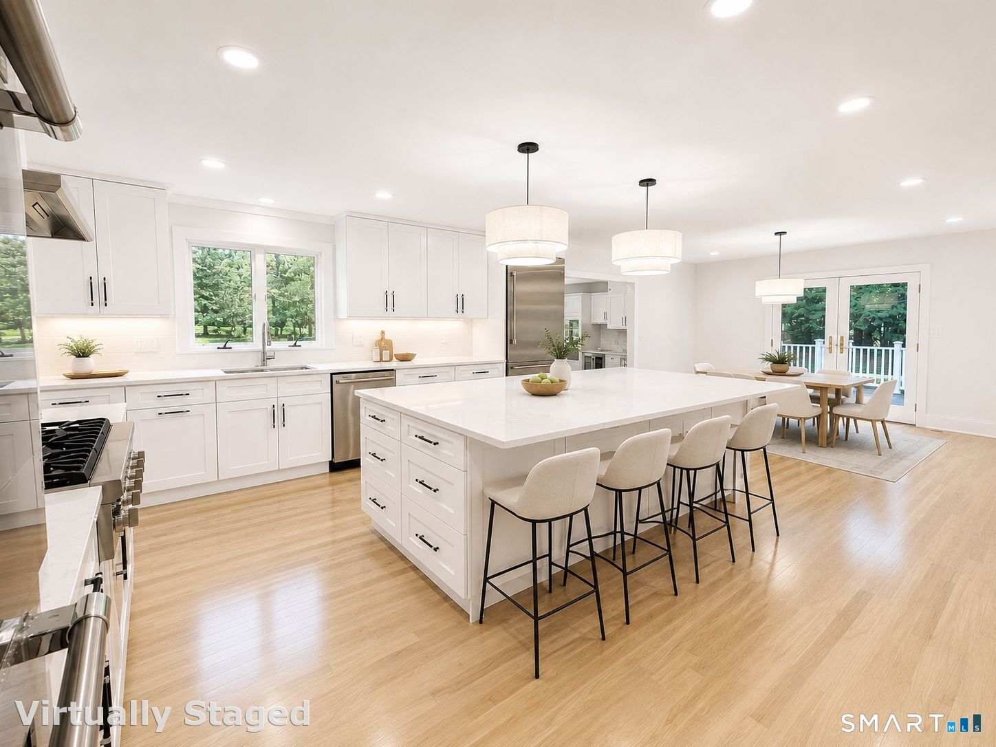 29 Flint Rock Road Stamford, CT 06903 - Photo 3 of 34 Thermador Appliances (propane cooktop, double-wall oven, dishwasher, fridge/freezer), oversized island, quartz countertops, refrigerator drawers, built-in pot filler, pendant lighting, under-cabinet lighting, etc.