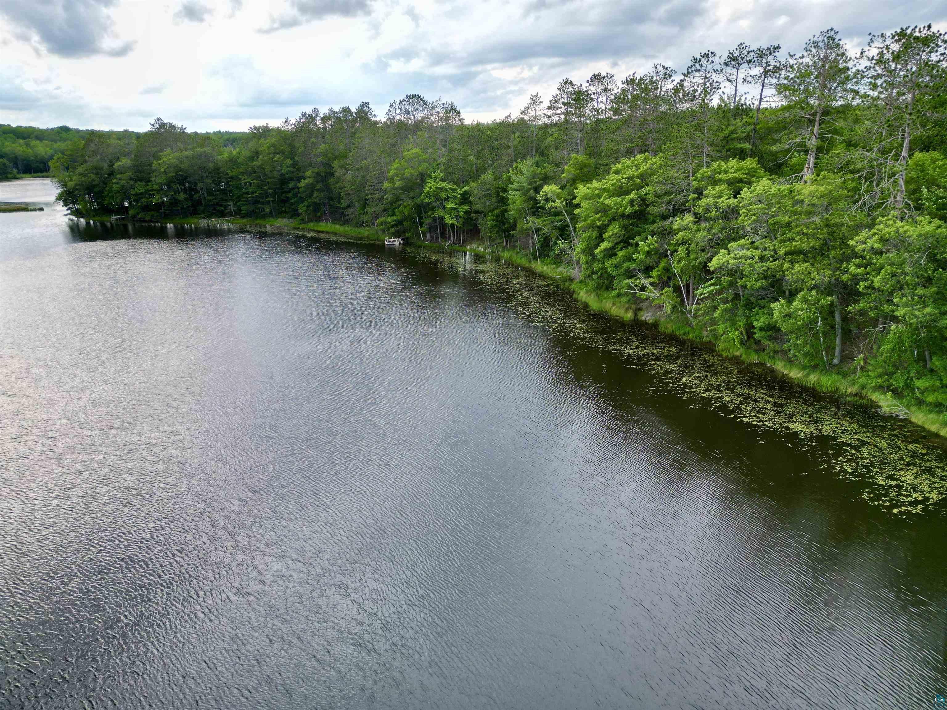 7621 White Beach Road Hayward, WI 54843 - Photo 3 of 26 Water view featuring a heavily wooded area