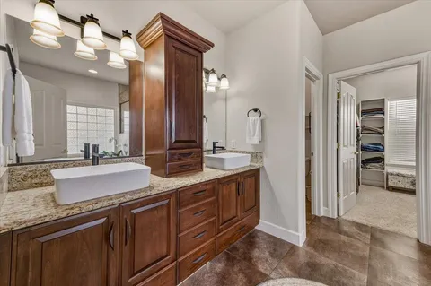 a bathroom with a tub and sink