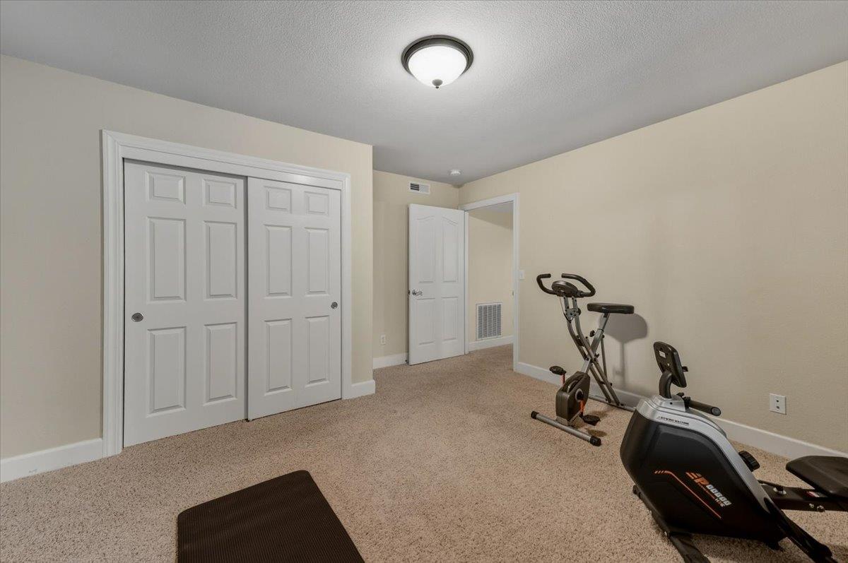 16041 John Way Grass Valley, CA 95949 - Photo 40 of 56 a view of a room with gym equipment