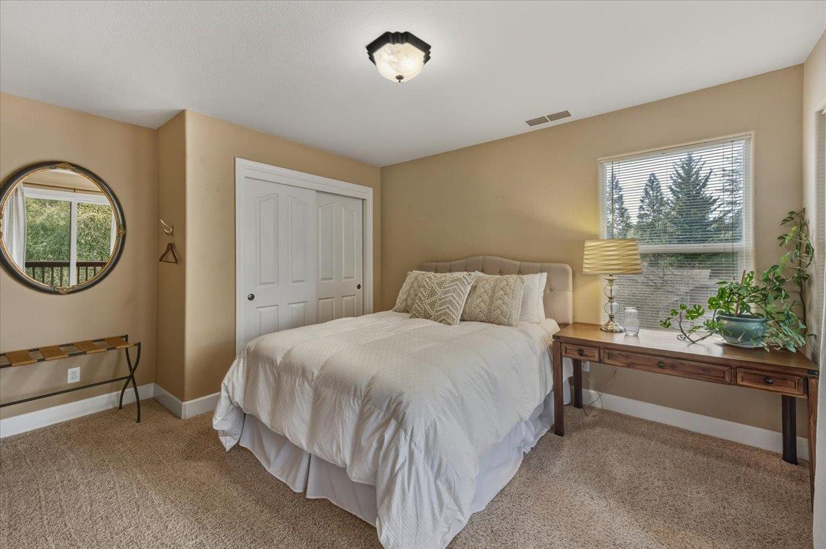 16041 John Way Grass Valley, CA 95949 - Photo 41 of 56 a bedroom with a bed and a window