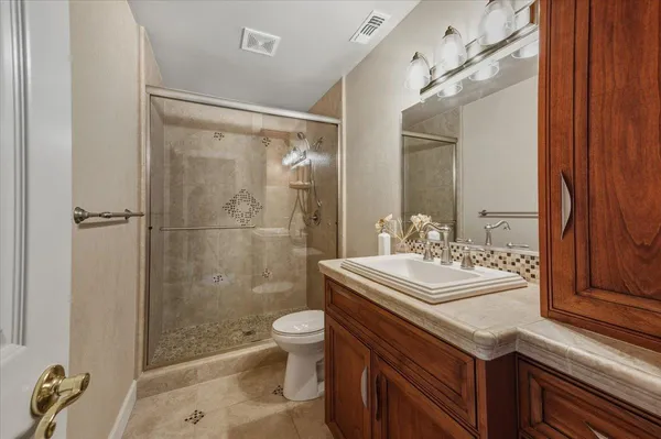 a view of a house with a yard and plants