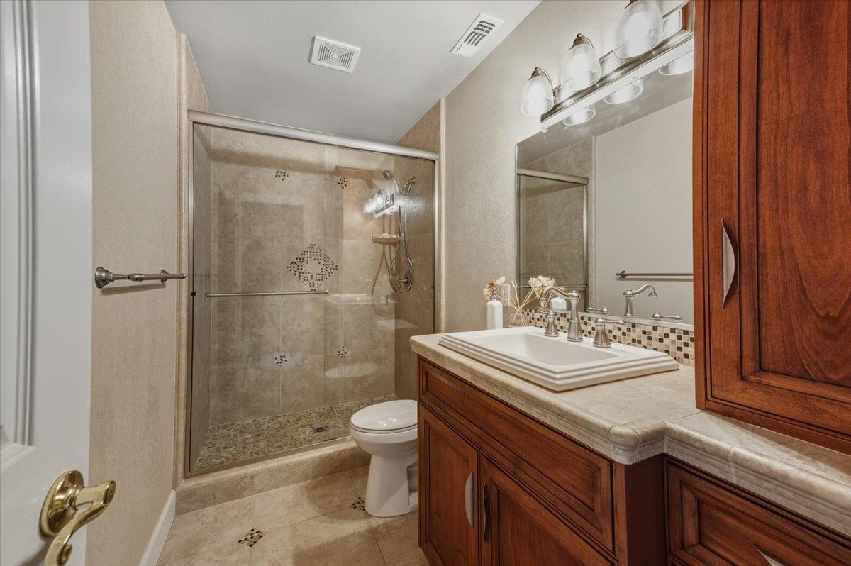 16041 John Way Grass Valley, CA 95949 - Photo 43 of 56 a bathroom with a sink toilet and shower
