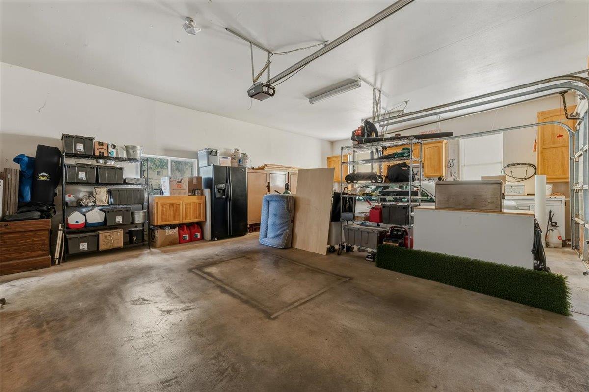 16041 John Way Grass Valley, CA 95949 - Photo 44 of 56 a view of a garage with storage