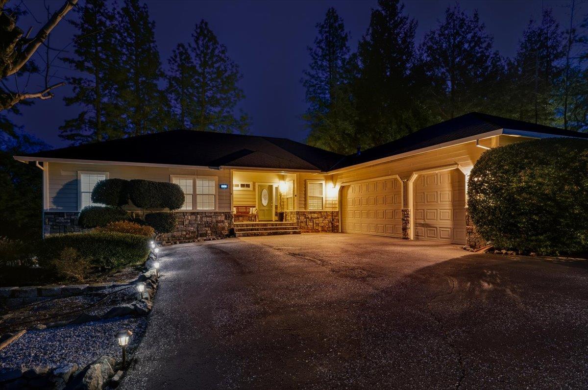 16041 John Way Grass Valley, CA 95949 - Photo 51 of 56 a view of a house with backyard and garden