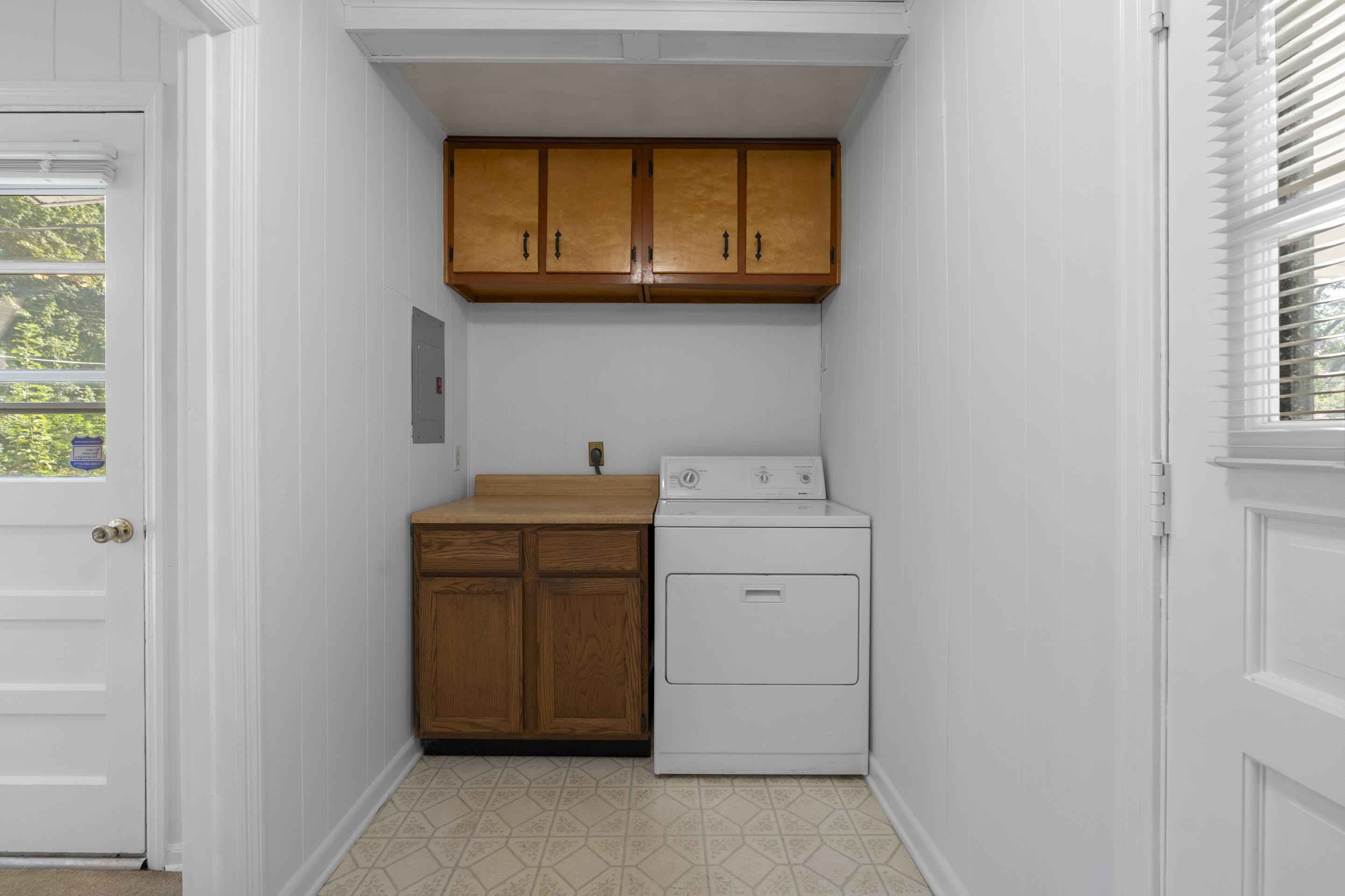 5076 Dee Road Memphis, TN 38117 - Photo 19 of 26 The laundry room opens to the kitchen.