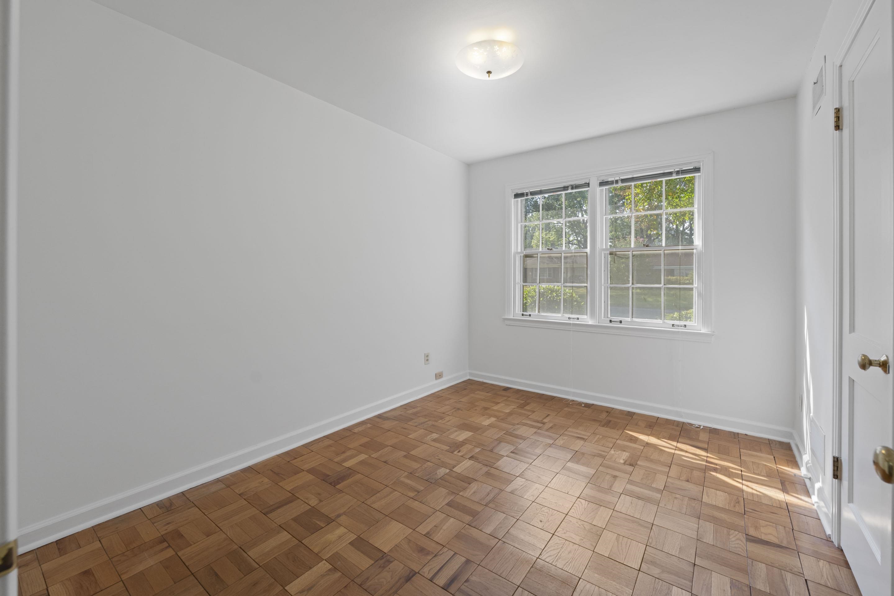 5076 Dee Road Memphis, TN 38117 - Photo 2 of 26 Flexible in function, this bedroom works beautifully as a guest room, nursery, or work-from-home office.