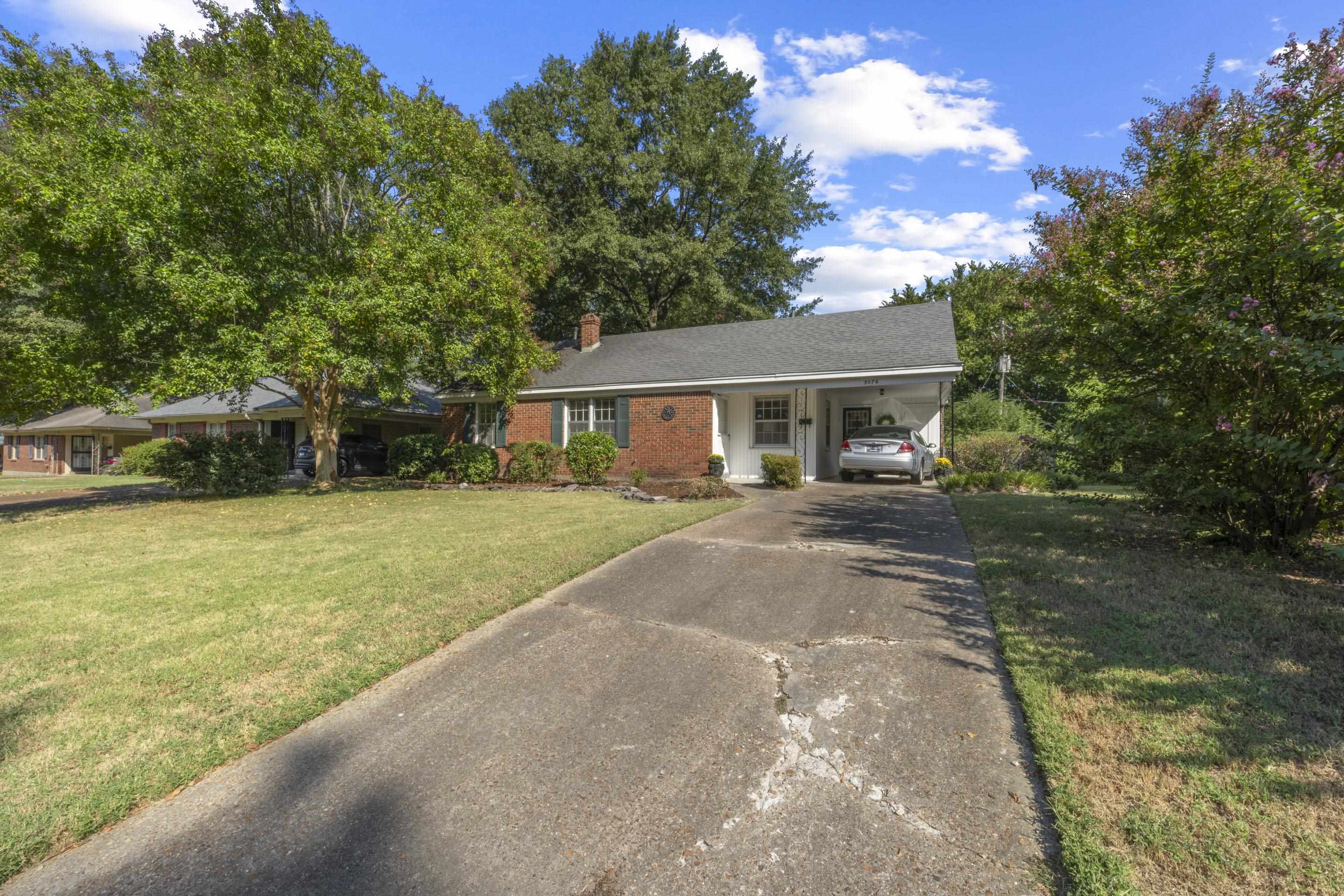 5076 Dee Road Memphis, TN 38117 - Photo 23 of 26 a view of house with a yard