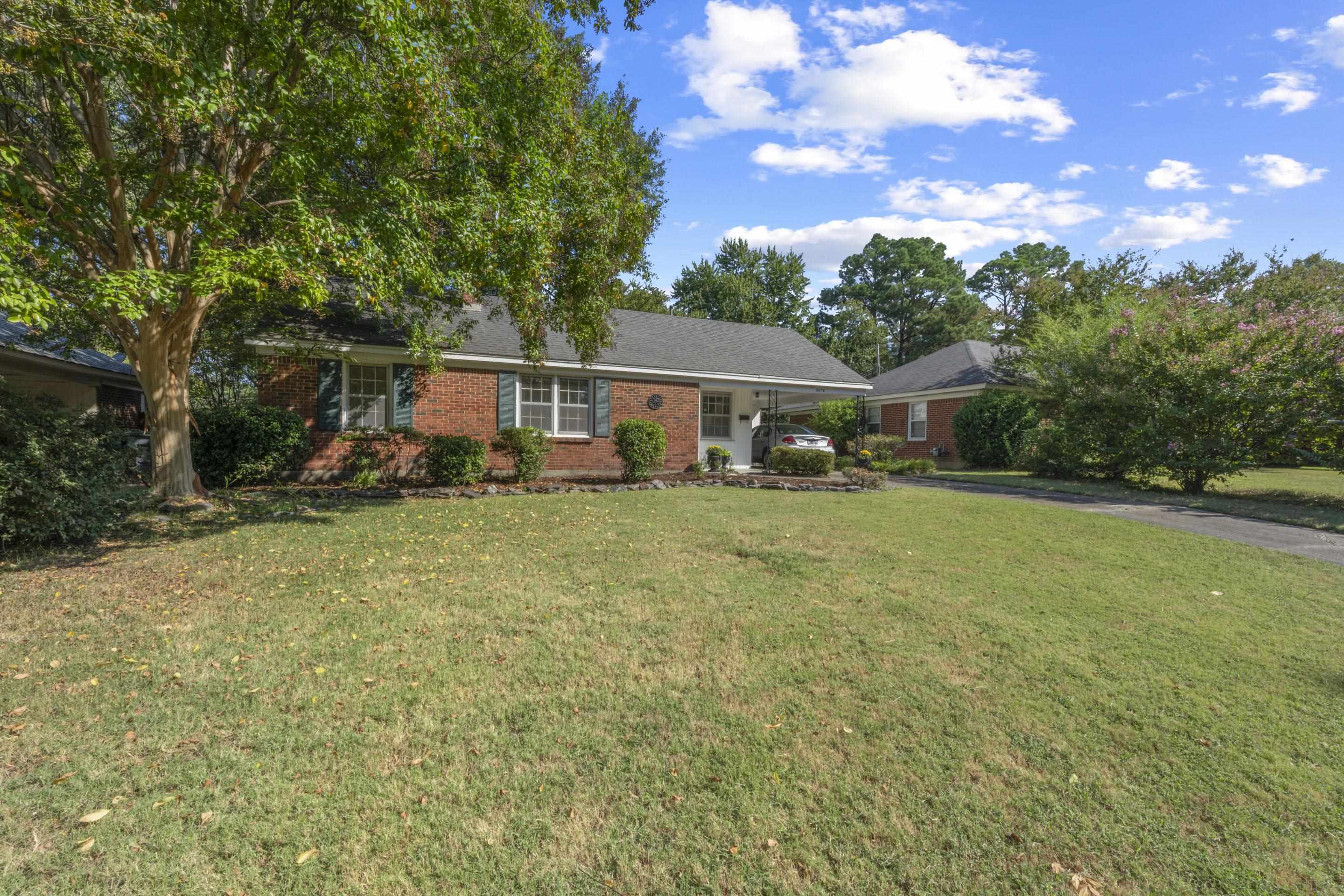 5076 Dee Road Memphis, TN 38117 - Photo 24 of 26 a view of a house with backyard porch and sitting area