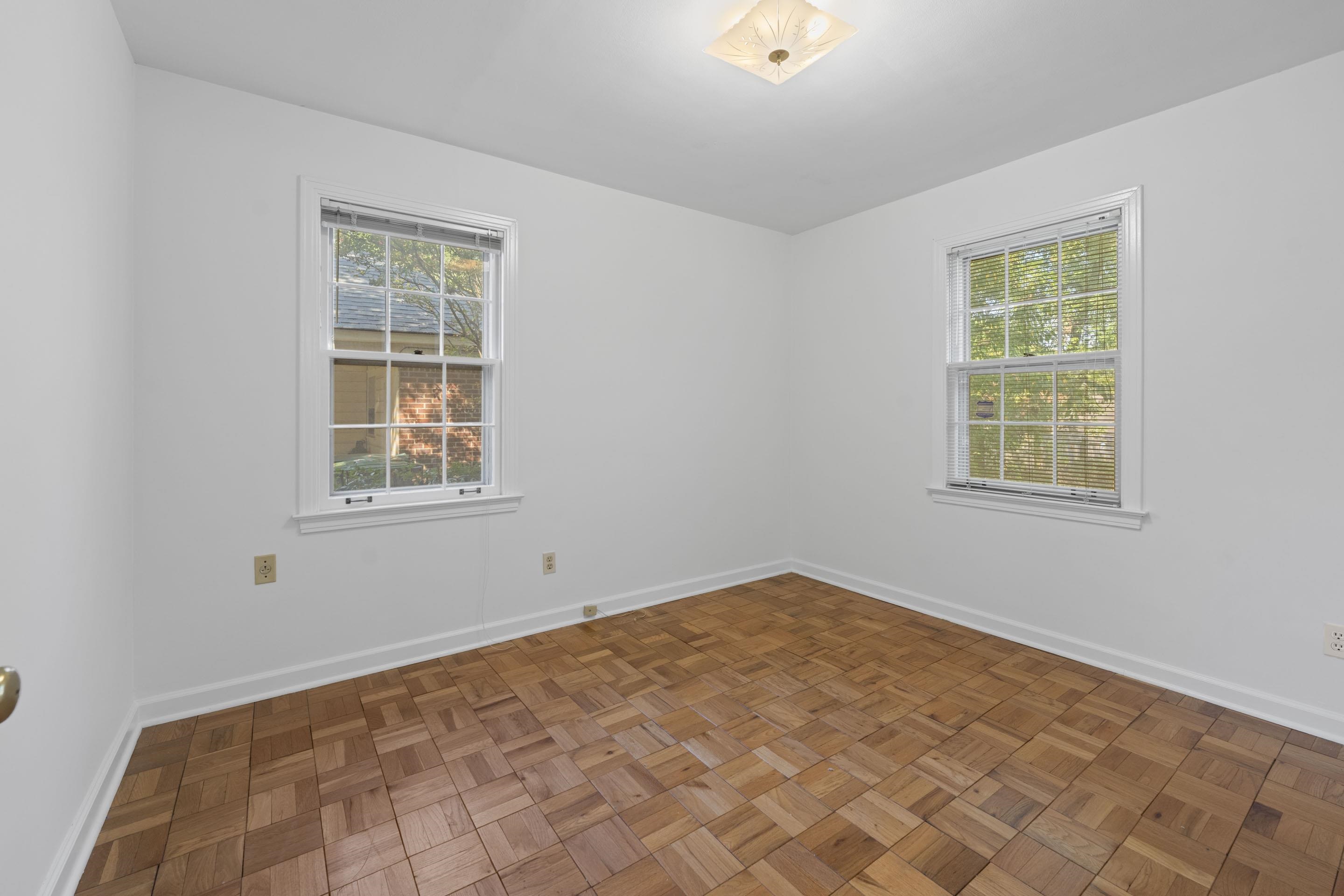 5076 Dee Road Memphis, TN 38117 - Photo 4 of 26 Hardwood floors and a soft color palette create a space ready for rest or play.