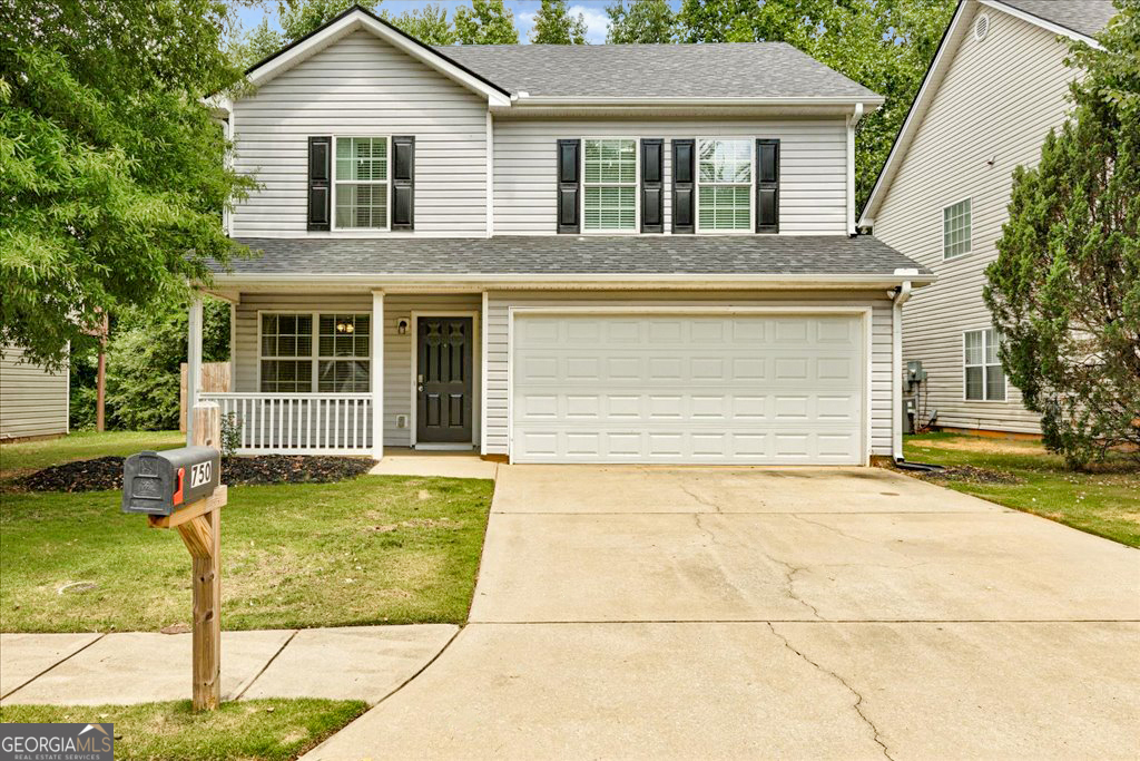 front view of a house and a yard
