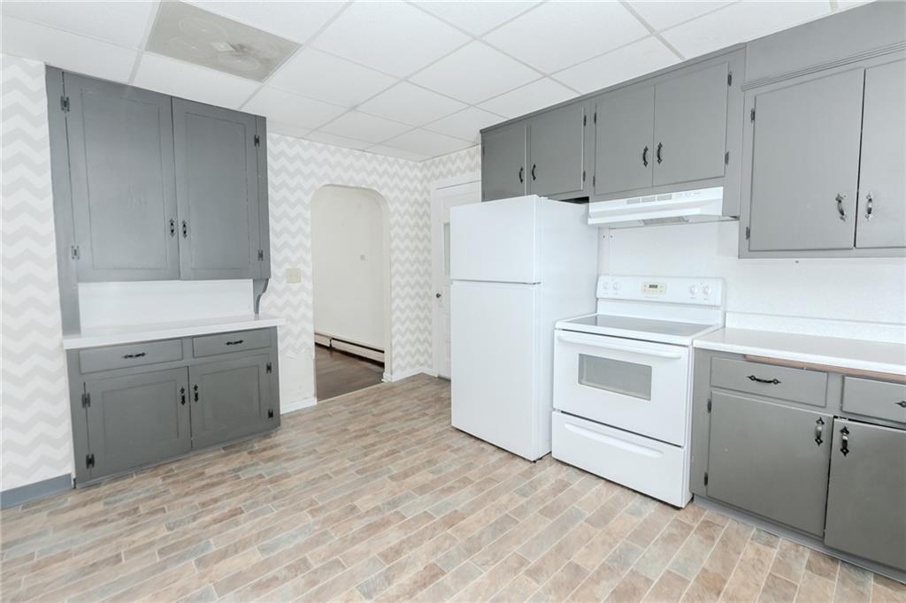 287 Main Street Ernest, PA 15739 - Photo 17 of 26 a utility room with cabinets washer and dryer