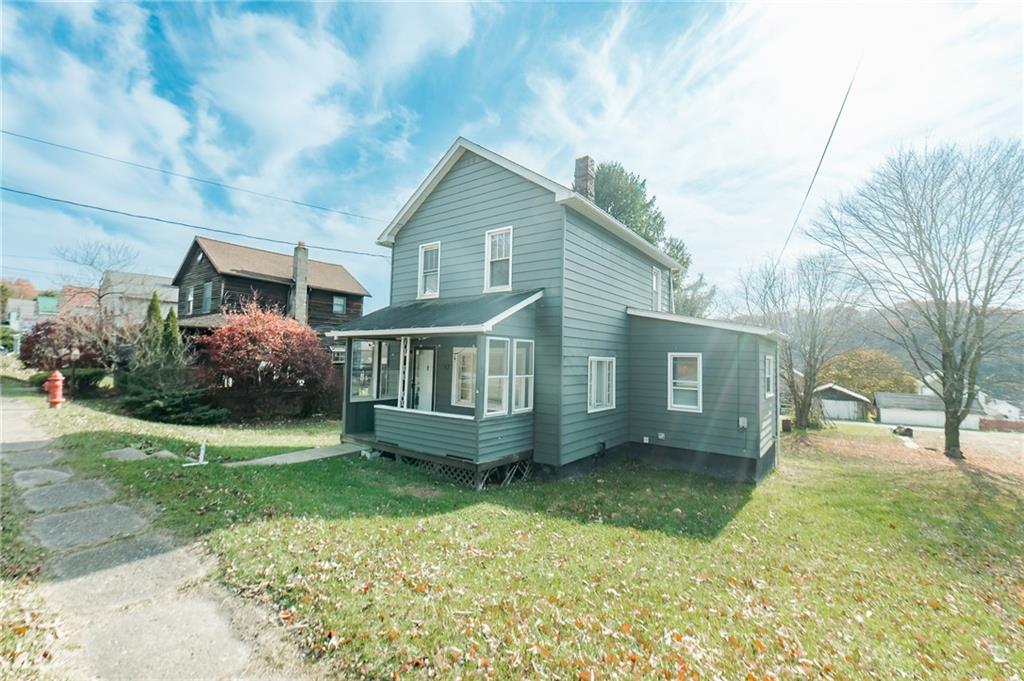 287 Main Street Ernest, PA 15739 - Photo 2 of 26 a front view of a house with garden