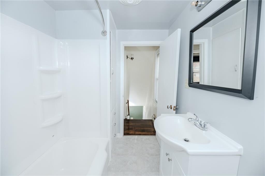 287 Main Street Ernest, PA 15739 - Photo 21 of 26 a bathroom with a sink and a mirror