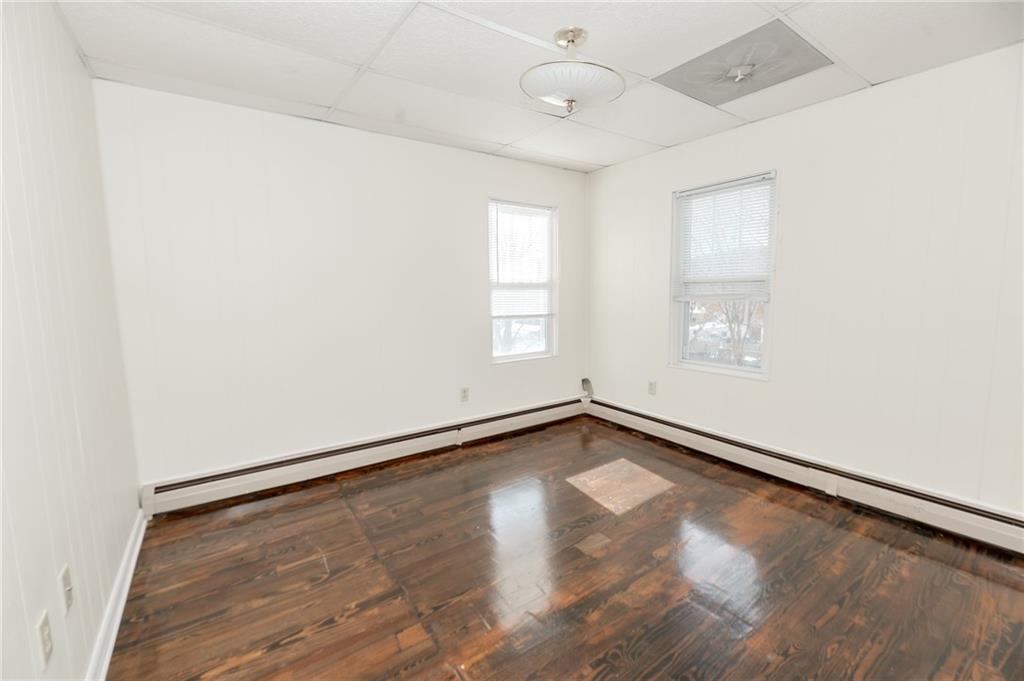287 Main Street Ernest, PA 15739 - Photo 24 of 26 wooden floor in an empty room with a window