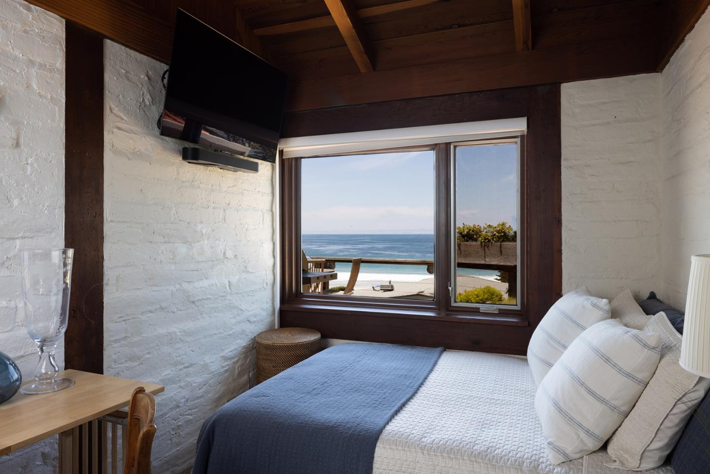 0 Scenic & 8th Corner Carmel, CA 93923 - Photo 16 of 27 a living room with furniture and a floor to ceiling window