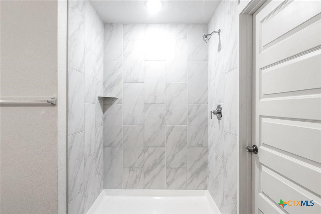 1904 Royal Loop Belton, TX 76513 - Photo 13 of 13 a bathroom with a shower