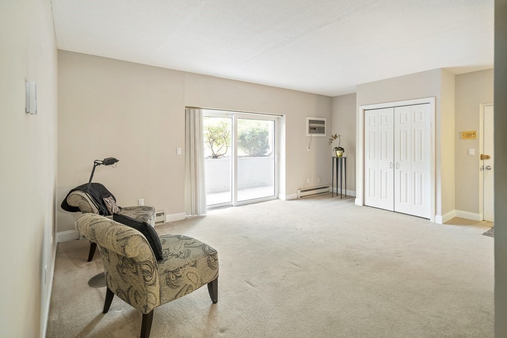 31 Hamlin Lane, Unit B11 Needham, MA 02492 - Photo 3 of 12 a view of a room with gym equipment