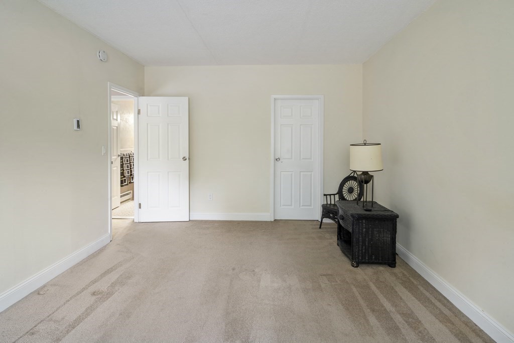 31 Hamlin Lane, Unit B11 Needham, MA 02492 - Photo 10 of 12 a view of a livingroom with washer and dryer