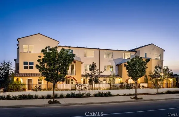 front view of a house with a street view