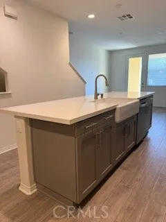 a spacious bathroom with a double vanity sink and a mirror