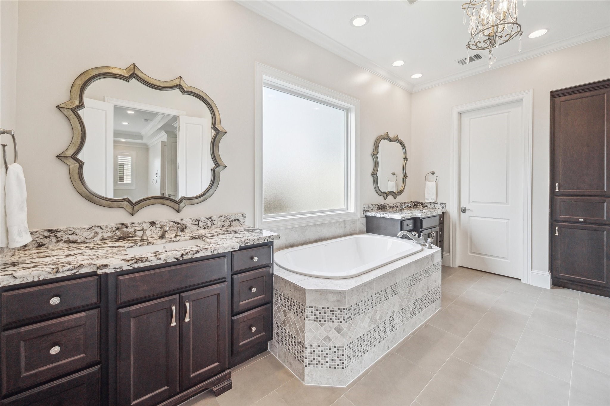 1523 Cunningham Parc Lane Houston, TX 77055 - Photo 12 of 37 a spacious bathroom with a sink double vanity and a mirror