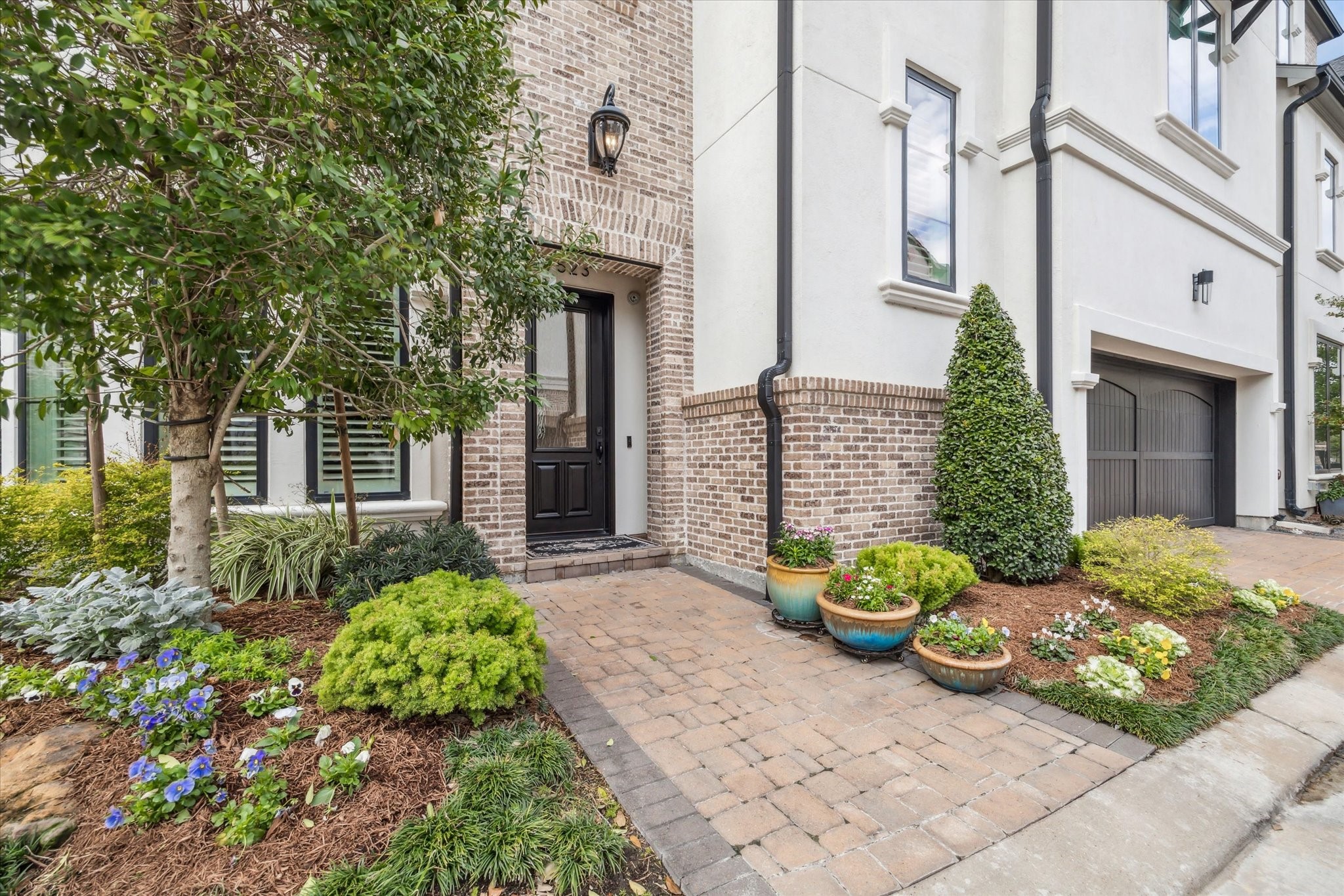 1523 Cunningham Parc Lane Houston, TX 77055 - Photo 2 of 37 a front view of a house