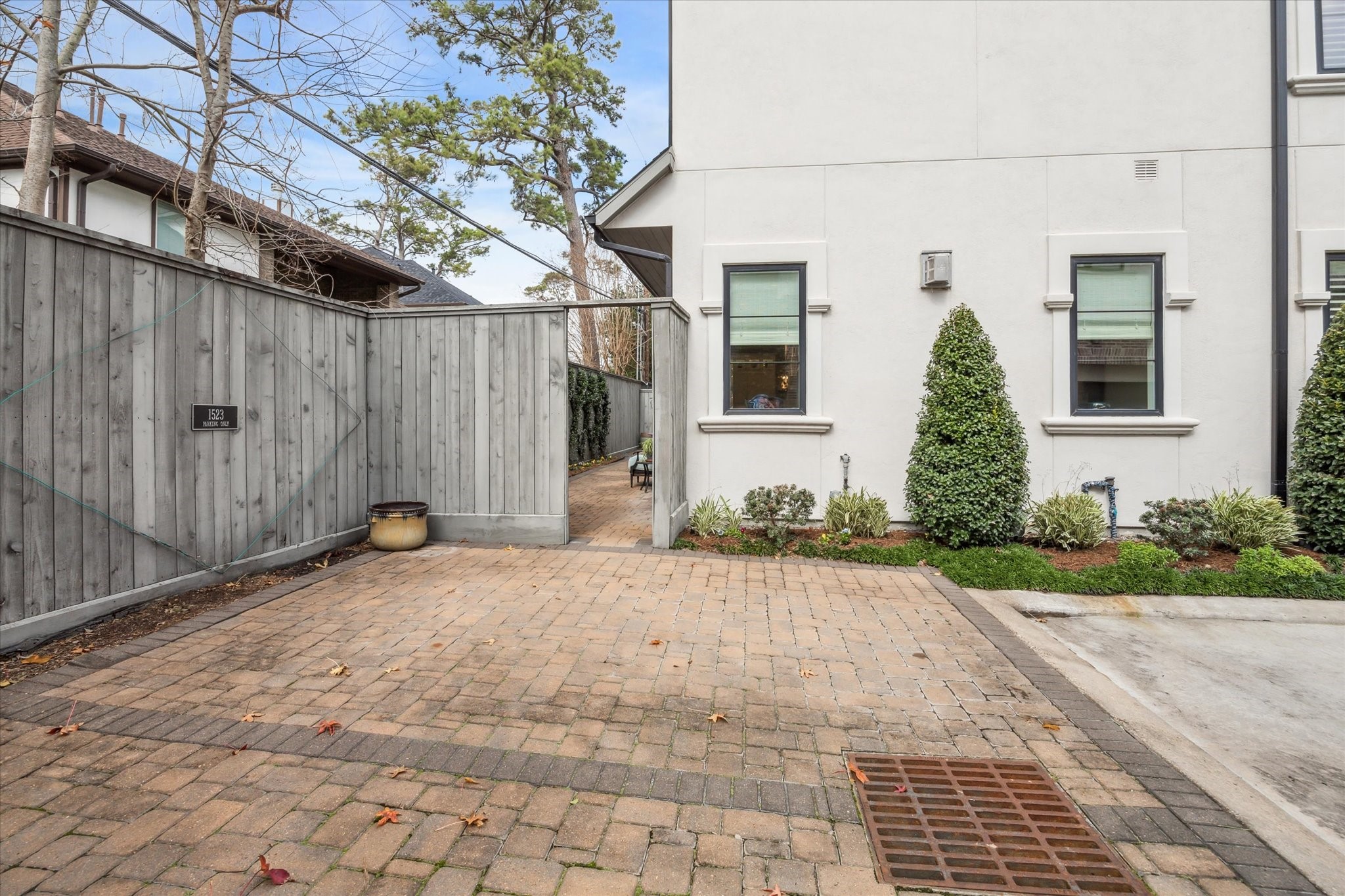 1523 Cunningham Parc Lane Houston, TX 77055 - Photo 30 of 37 a front view of a house with a yard and a garage