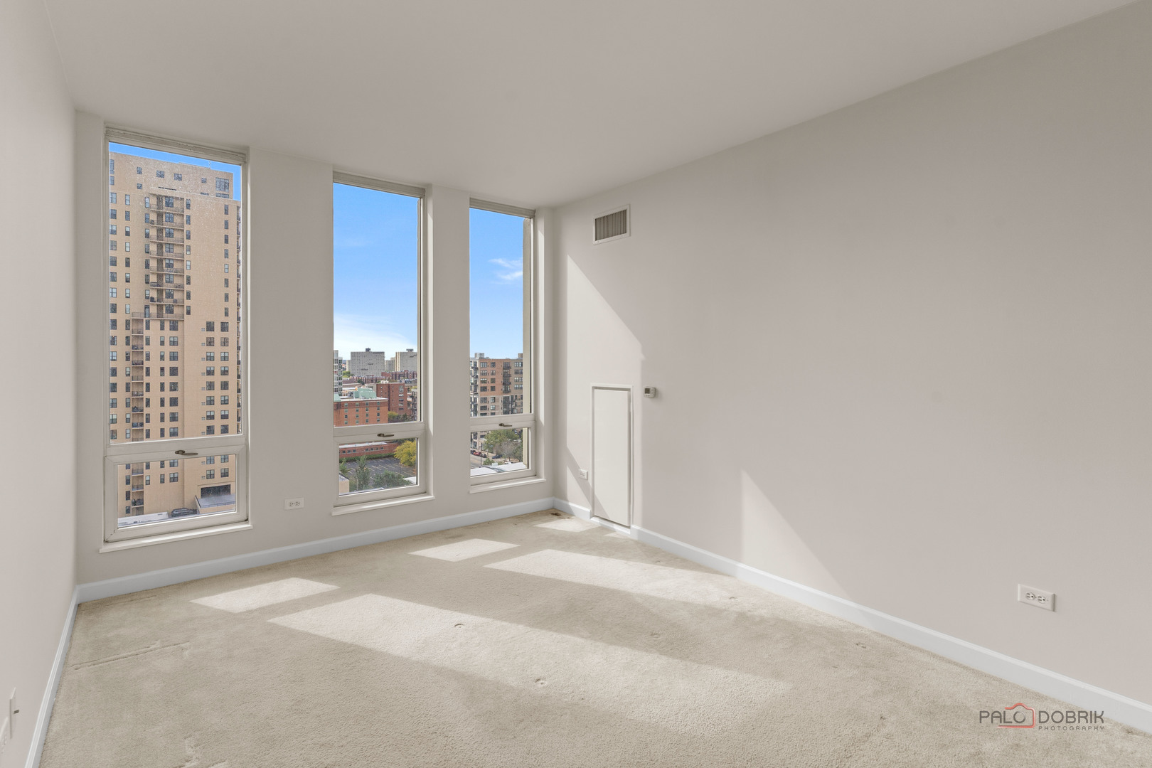 1400 South Michigan Avenue, Unit 1404 Chicago, IL 60605 - Photo 11 of 26 a view of a big room with windows and closet