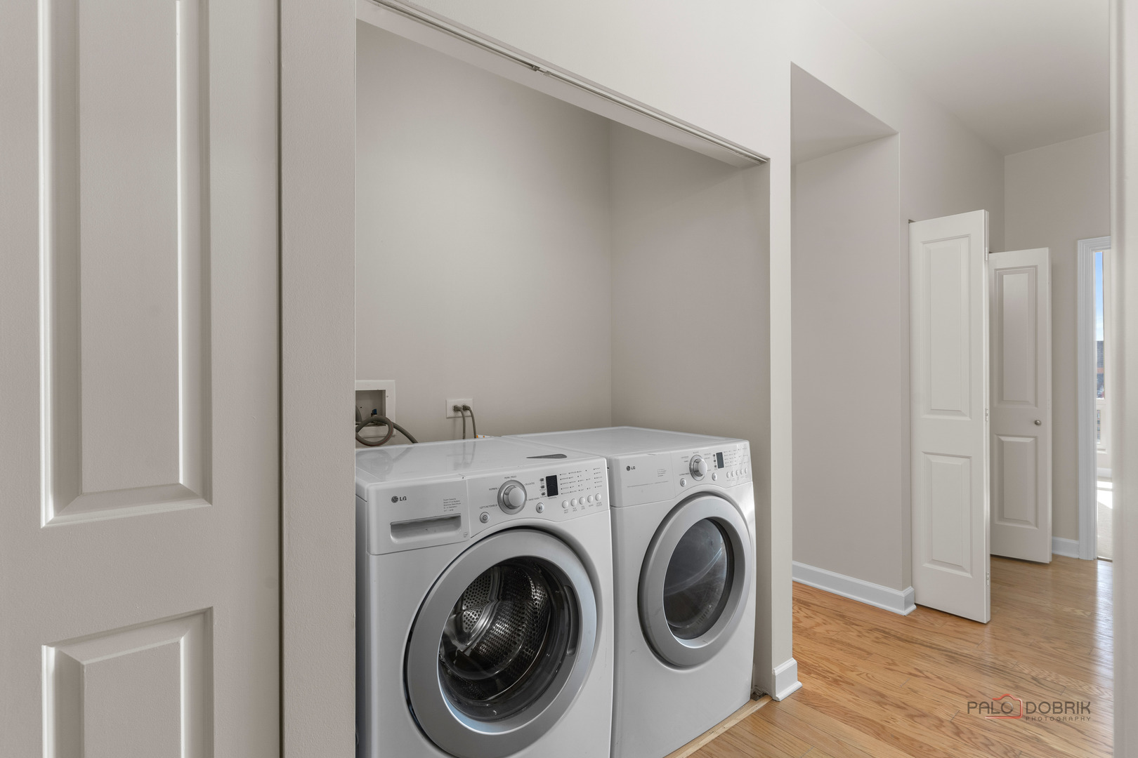 1400 South Michigan Avenue, Unit 1404 Chicago, IL 60605 - Photo 20 of 26 a utility room with dryer and washer