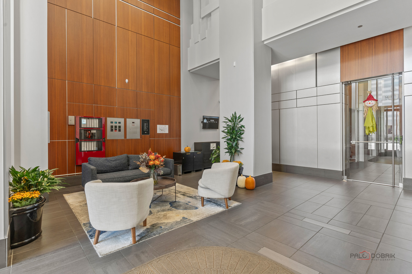 1400 South Michigan Avenue, Unit 1404 Chicago, IL 60605 - Photo 3 of 26 a living room with furniture and flowers