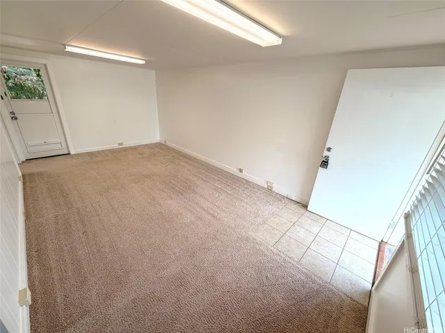 a kitchen with a refrigerator a sink and a stove