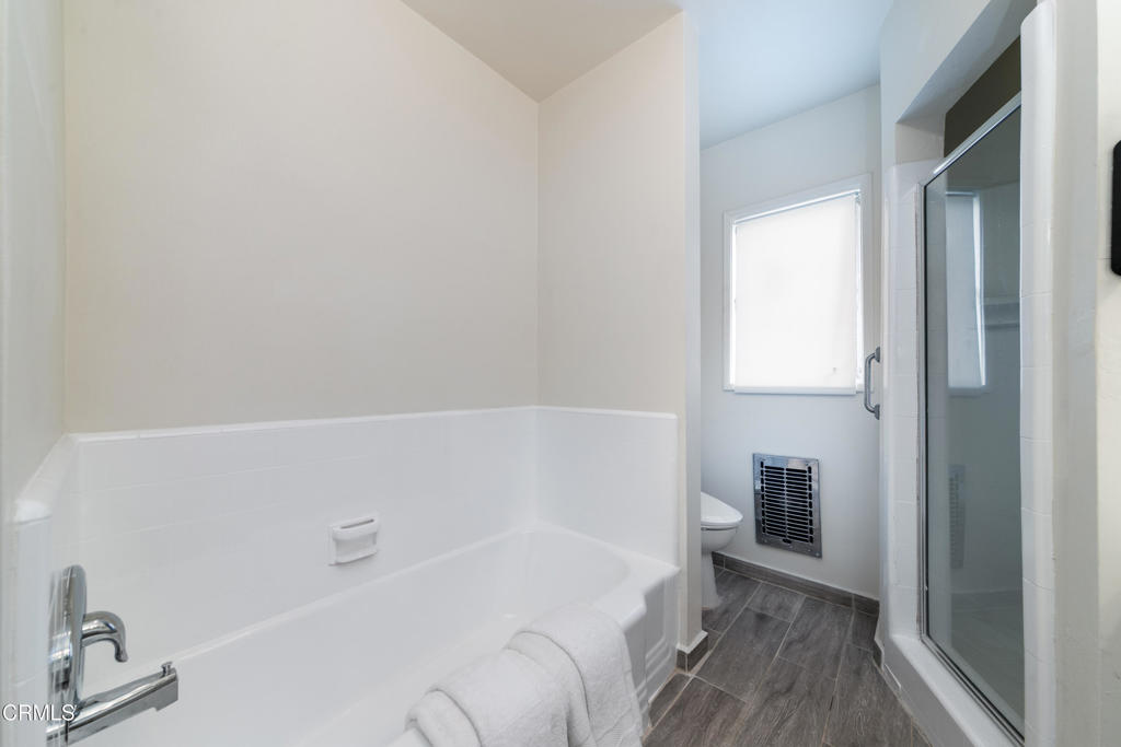1305 Solita Road Pasadena, CA 91103 - Photo 20 of 33 a bathroom with a bathtub and a sink
