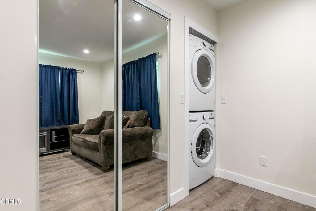 1305 Solita Road Pasadena, CA 91103 - Photo 32 of 33 a living room with furniture and a washer dryer