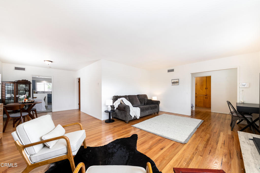 1305 Solita Road Pasadena, CA 91103 - Photo 6 of 33 a living room with furniture and a rug