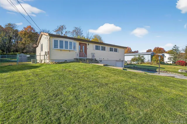 a house view with a garden space