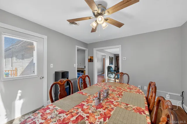 a bed room with a bed and a large mirror