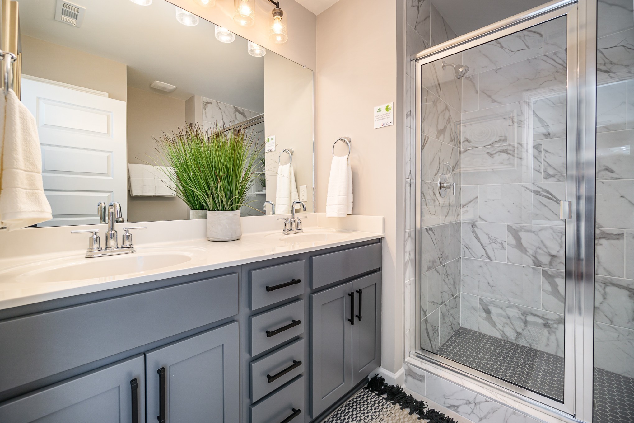 1752 Fenway Loop Antioch, TN 37013 - Photo 24 of 38 a bathroom with a shower sink and mirror