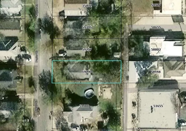 an aerial view of houses and roads