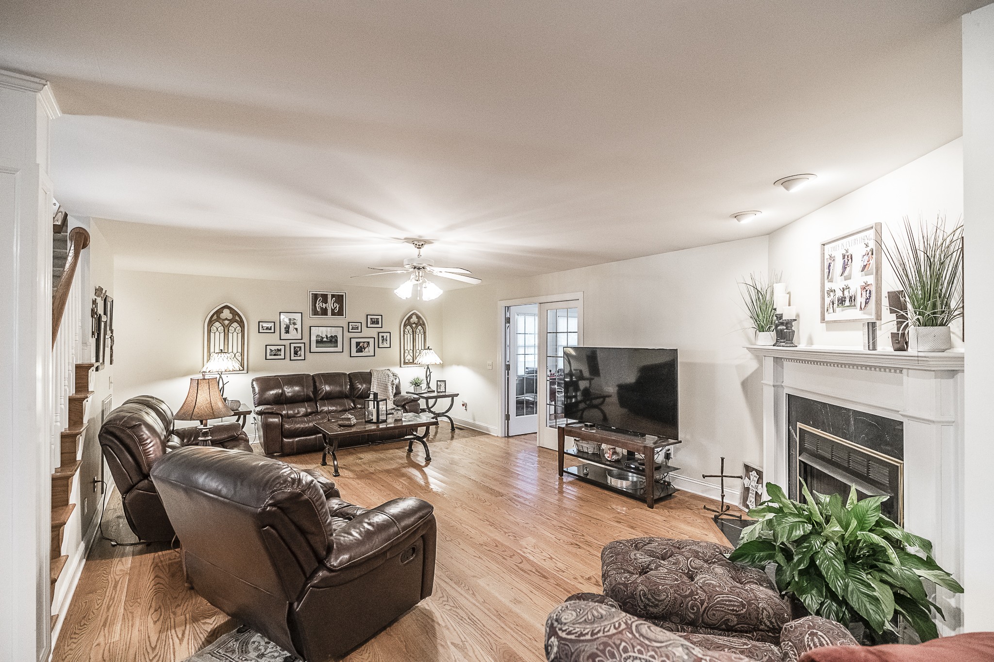 182 Calvert Ridge Road Westmoreland, TN 37186 - Photo 11 of 50 a living room with furniture a flat screen tv and a fireplace