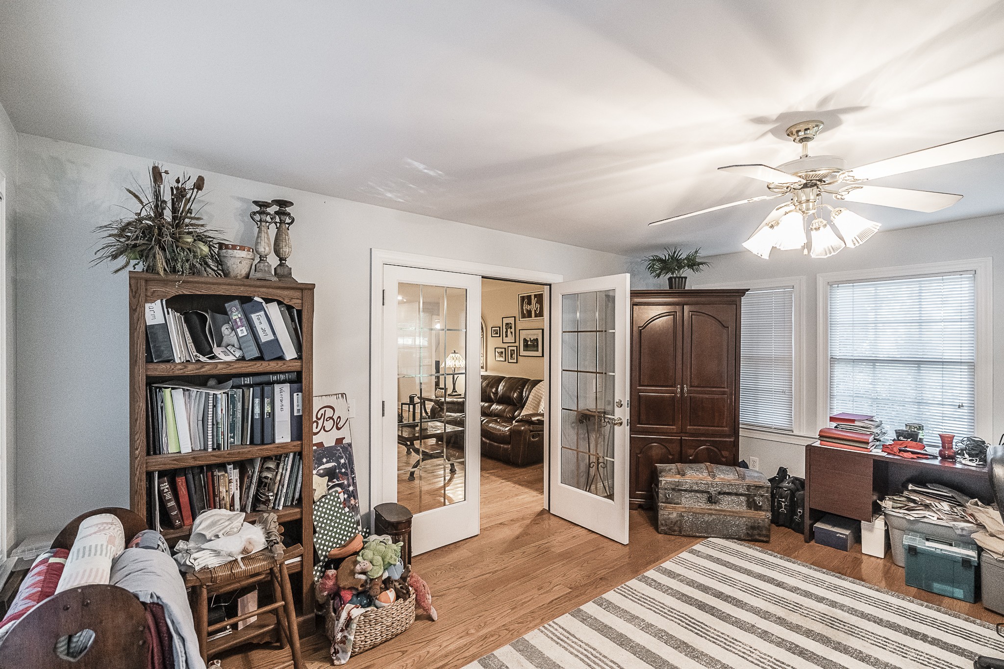 182 Calvert Ridge Road Westmoreland, TN 37186 - Photo 15 of 50 a living room with furniture a bookshelf and a window