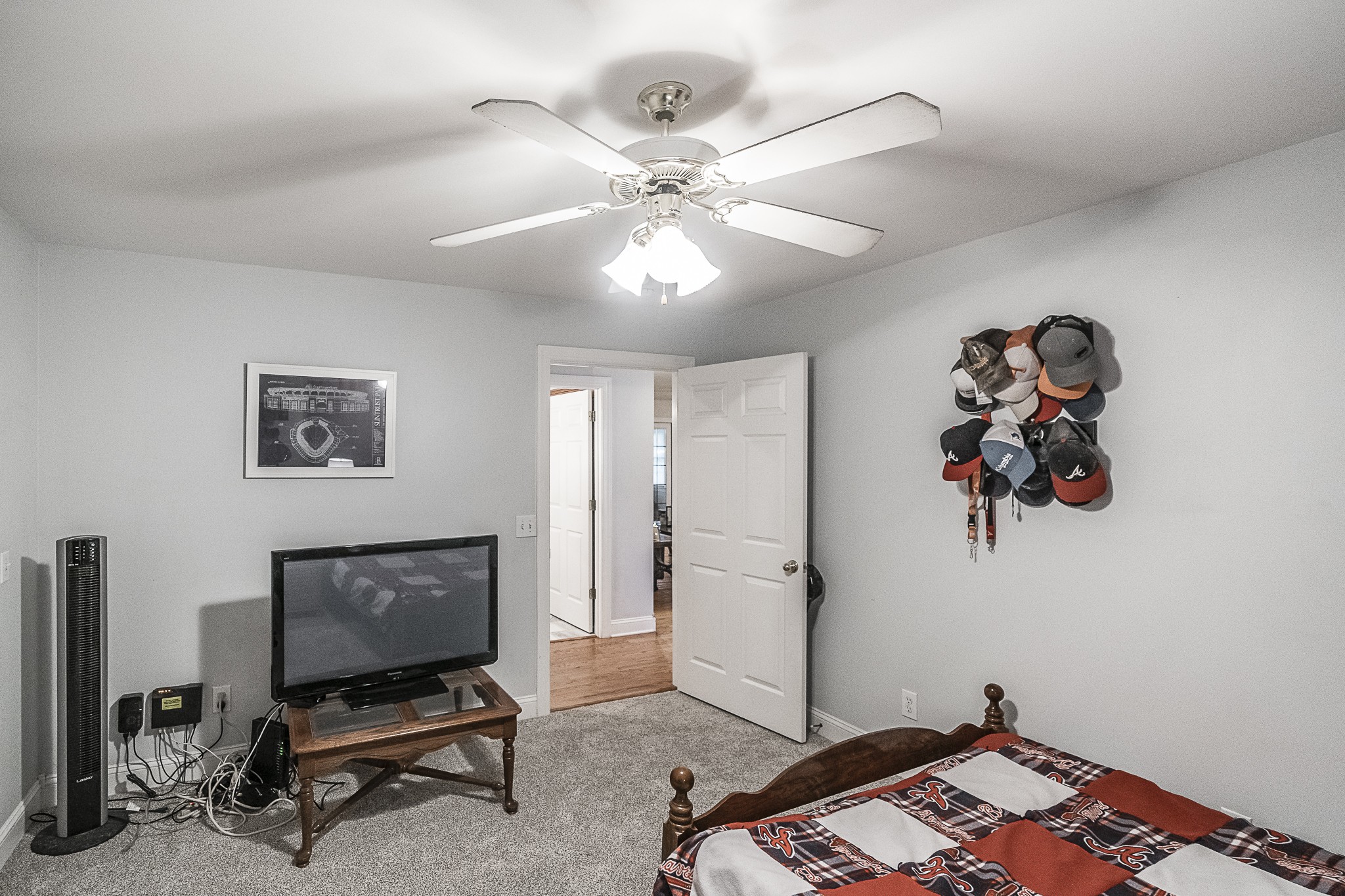 182 Calvert Ridge Road Westmoreland, TN 37186 - Photo 20 of 50 a bedroom with a bed and a chandelier