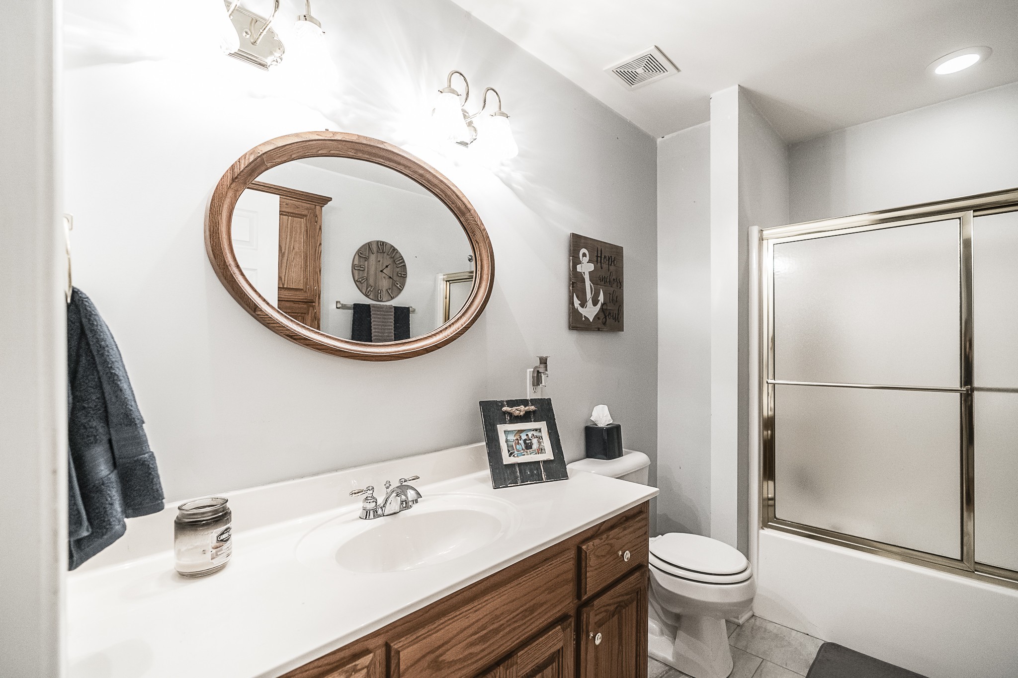 182 Calvert Ridge Road Westmoreland, TN 37186 - Photo 21 of 50 a bathroom with a toilet a sink and a mirror