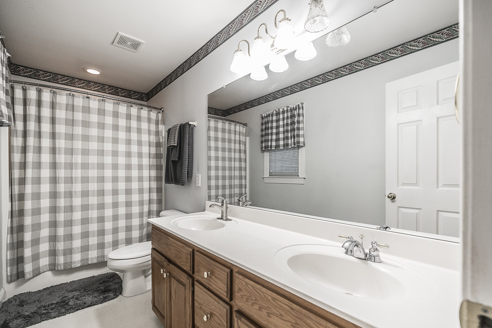 182 Calvert Ridge Road Westmoreland, TN 37186 - Photo 26 of 50 a bathroom with a sink a toilet and shower